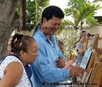 Hawaii Plein Air artist Mark N. Brown shows is students the finer points of Plein Air Art during his art workshop