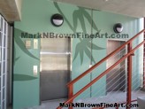 Hosoi Floral Mural makes a plain building come to life. Created by Hawaii mural artist Mark Brown.