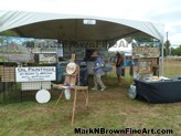 Plein Air Artist Mark N. Brown's booth showcases some of his best artwork