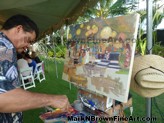 Mark N. Brown paints live on site during a wedding reception