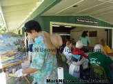 Plein Air artist Mark N. Brown creates his live artwork during the Lanikai Woes Day Parade