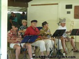 Local musicians entertain the crowd at the Lanikai Woes Day Parade