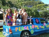 Ladies of this float share their love, peace and aloha at the Lanikai Woes Day Parade