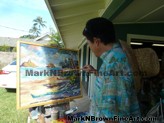 Mark N. Brown puts the finishing touches on his Plein Air art