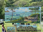 Mark N Brown showcases some of his Plein Air artworks at the Lanikai Woes Day Parade