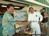 Hawaii artist Mark N. Brown greets the the winning bidder
