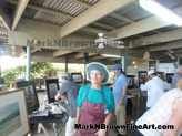Minnesota Artist Mary Pettis<br>Mary Pettis of Minnesota is standing near her painting after the completion of her Jodo mission painting, the initial kick off of the Maui event on 2/14/2015