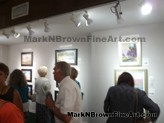 Viewing the Artists Painting<br>Art patrons during the 2015 Maui Plein Air Painting Invitational view the artists paintings.