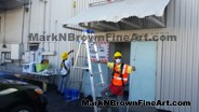 Hawaii Artist Mark N Brown and team work on the Nishimoto Trading Co Mural